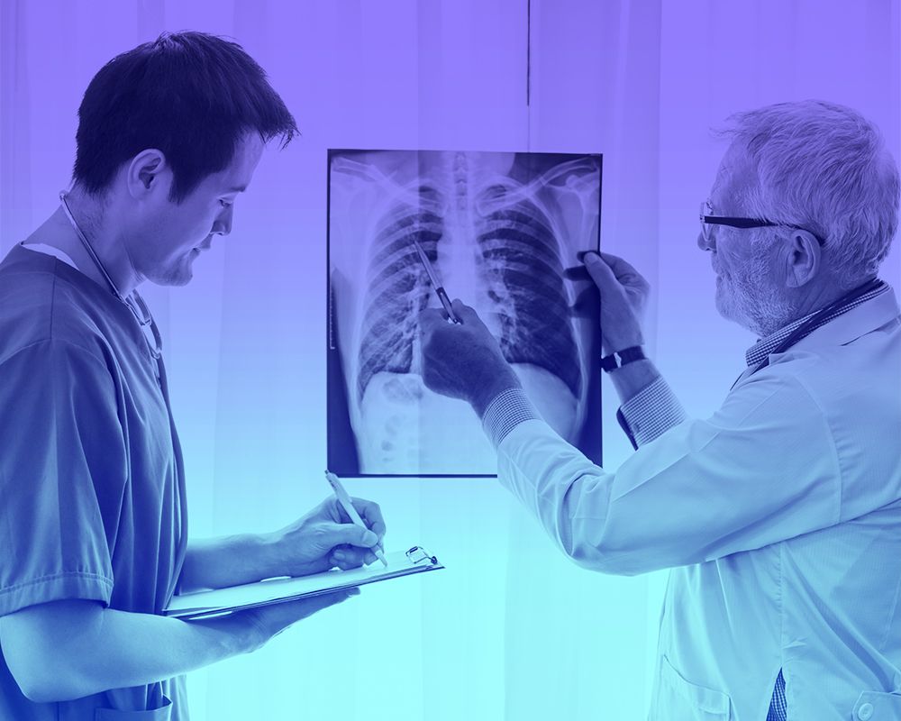 Image of doctors looking at an x-ray